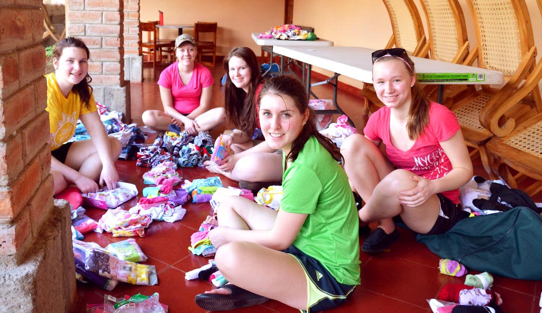 Volunteers sorting donations